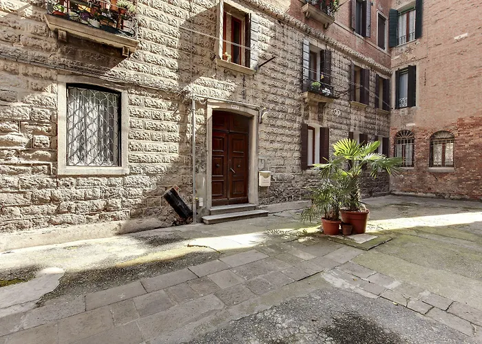 White Flowers With Canal View By Wonderful Italy